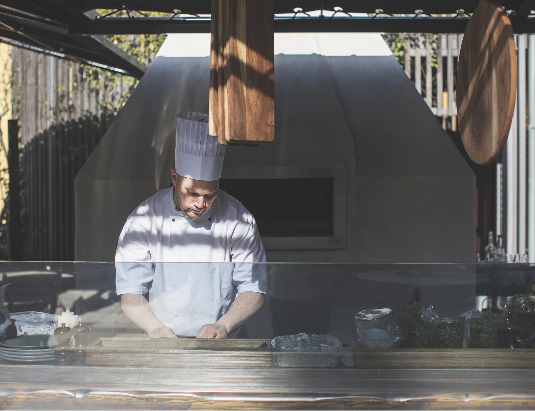 1 Hotel Copenhagen Exterior photo A chef working in a restaurant kitchen